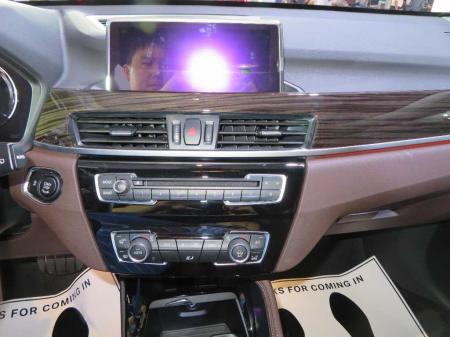 bmw x1 sDrive18i. price 1650 lacs kyats. 3 cylinders engine petrol. 7 speed steptronic transmission